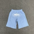 Light blue shorts (printed in white)