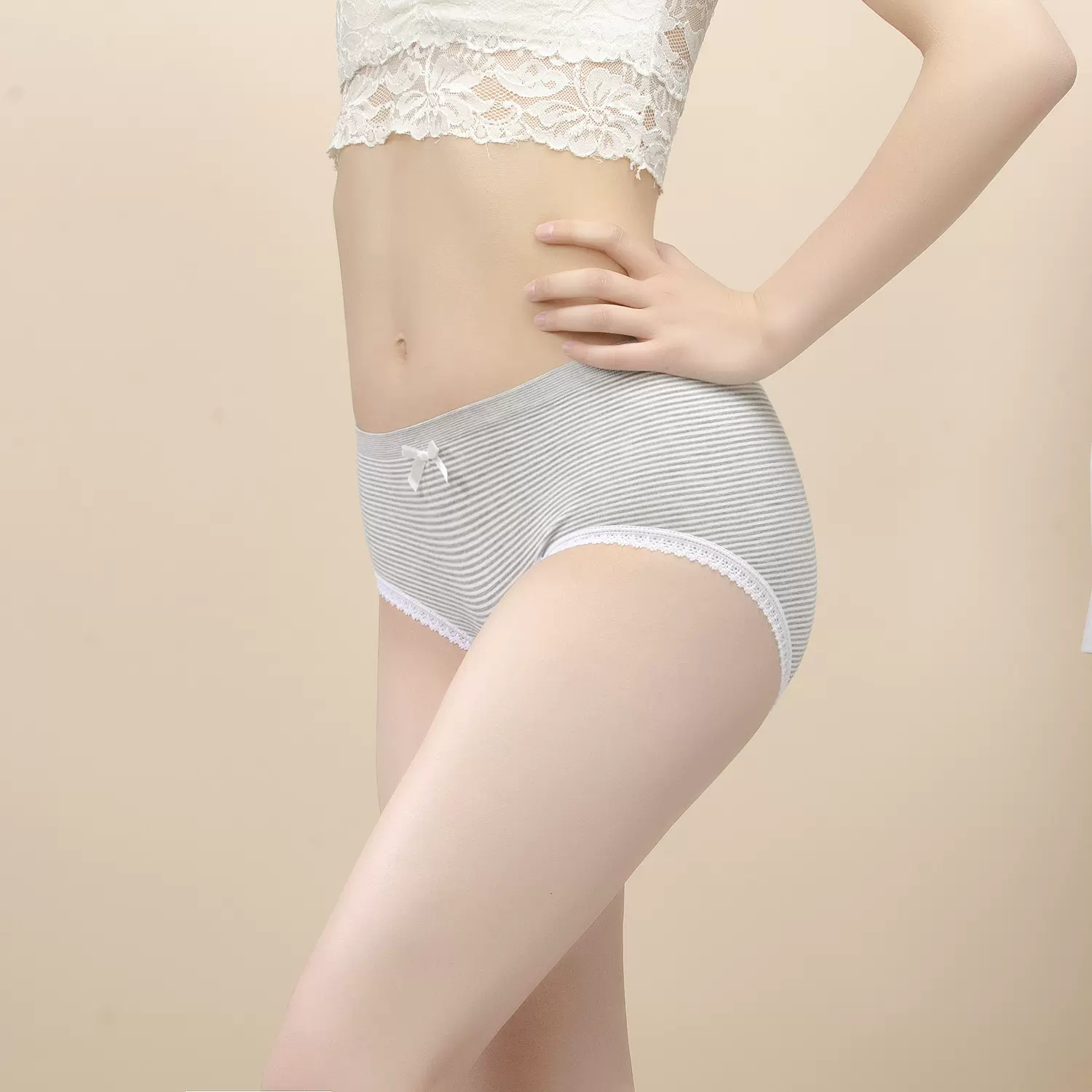 条纹花边蝴蝶结无缝一体编织中低腰大弹力女式三角内裤代发Z681