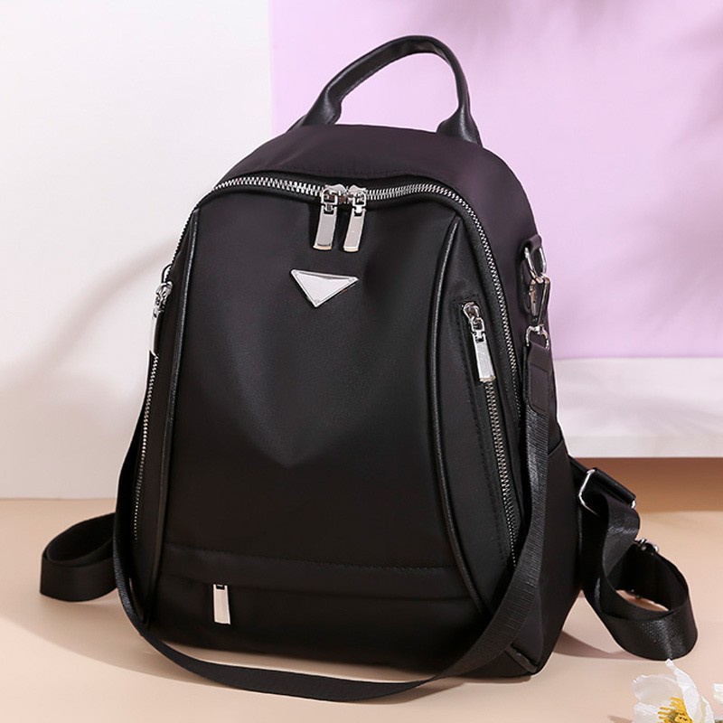 2023 verano nuevo estilo coreano casual Oxford tela mochila femenina moda simple mochila de viaje multifuncional al por mayor