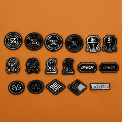 Thick-sheet silicone heat-transfer labels, silicone nameplates, TPU soft labels, and stainless steel hardware tags—garment accessories in European and American styles