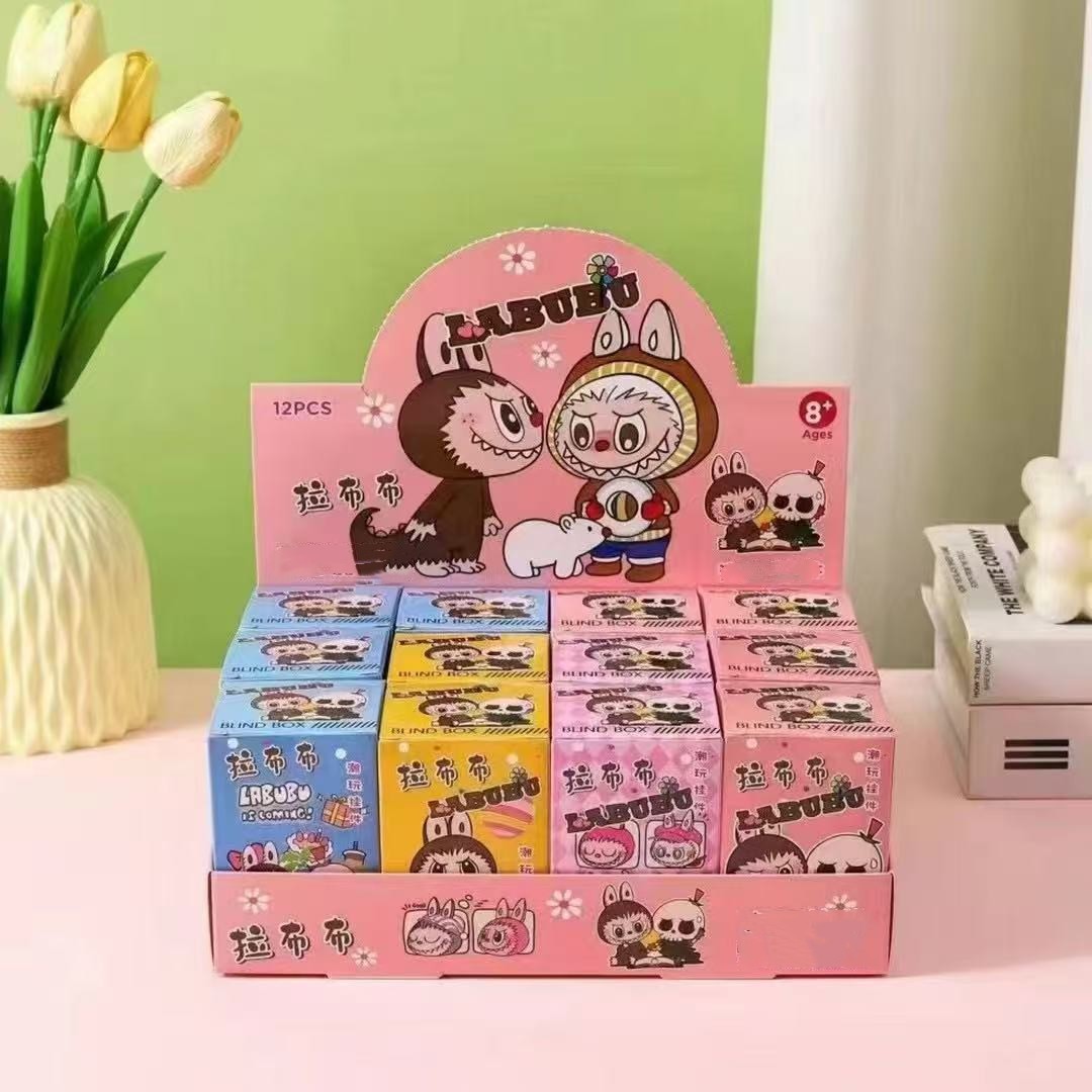 Juguete de los nuevos niños ciego caja muñeca de dibujos animados lindo llavero muñeca 2 paquete al por mayor puesto pequeño regalo