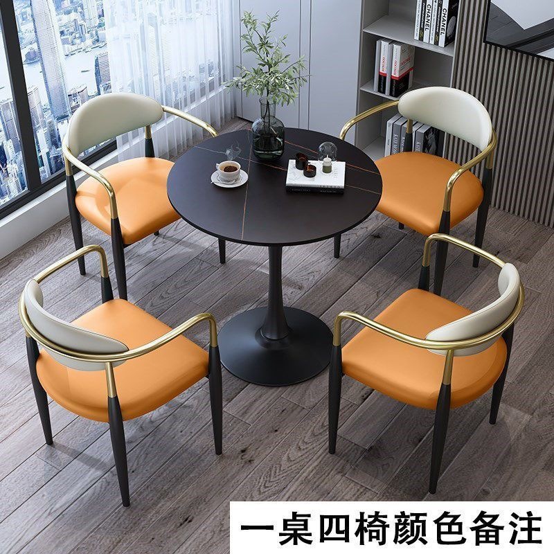 Black legs + black rock slab table with four chairs [color to be specified]
