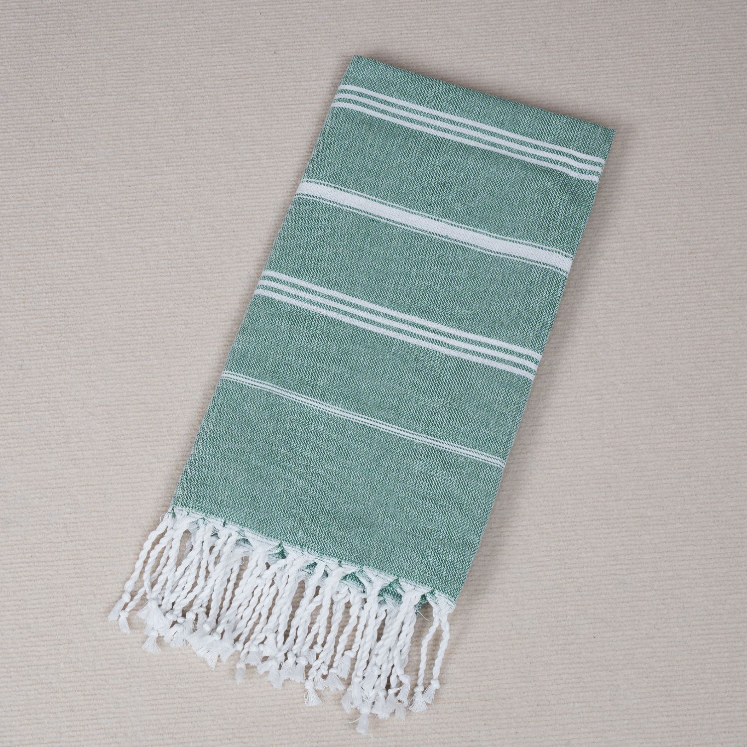 Horizontal striped beach towel colorful green