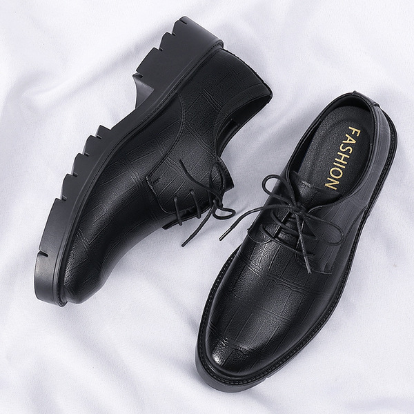 Men's shoes with hidden heel