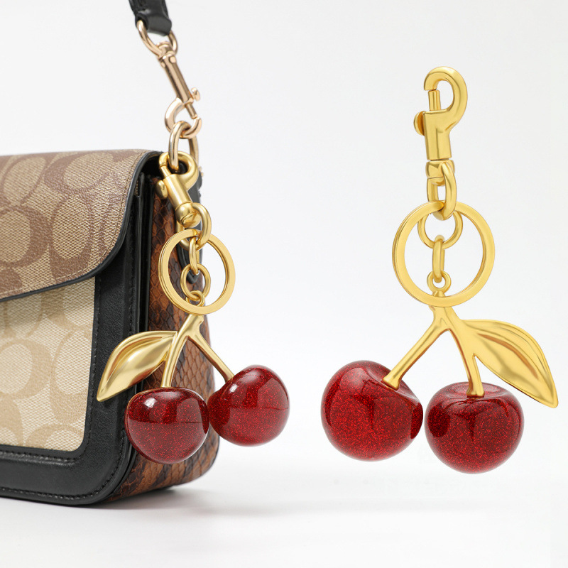 Cherry Fruit Bag Colgante Car Centimetro Keychain Colgante Bolso de mano Creativo Damas Regalos Decoración del automóvil