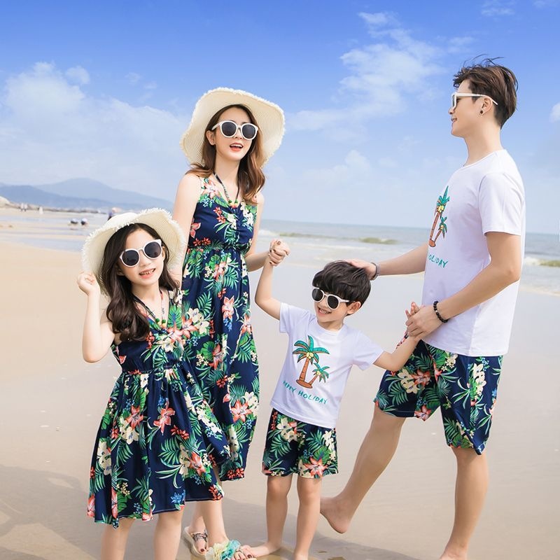 Beach vacation outfits for families of three or four: stylish mother-daughter dresses for the whole family.