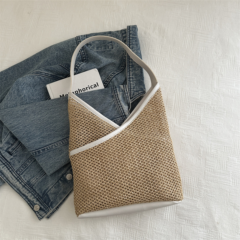 Popular bolsa de tejido de gran capacidad para mujeres 2024 verano nueva bolsa de hombro universal bolsa de viaje de moda