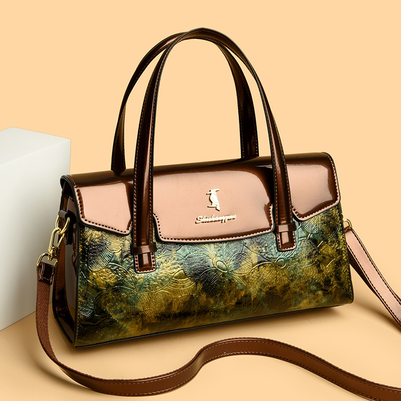 Luz lujosa 2024 nueva moda nueva bolsa china de cuero brillante de gran capacidad bolso de hombro bolso de almohada una bolsa de cabello