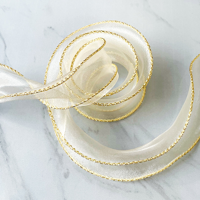 Fábrica en stock Venta caliente 4cm hilado curvado con flores material de embalaje de regalo con cinta de flores elegante hilo de cola de pescado