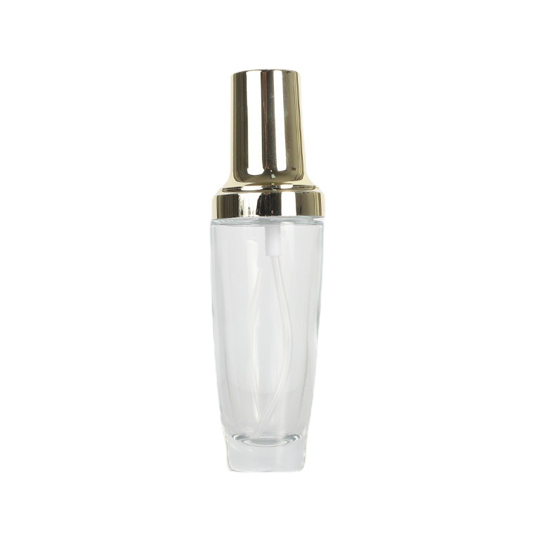 Tapa de oro transparente botella de vidrio esencia botella de loción crema cosmética crema conjunto botella aceite esencial sub-embalaje botella de spray