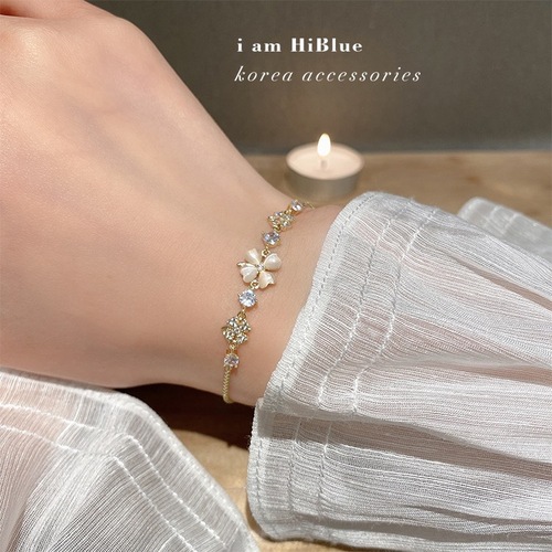Korean style four-leaf clover micro-encrusted zircon bracelet with adjustable drawstring design cat’s eye clover jewelry