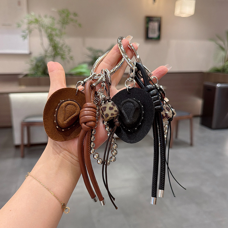 Vintage Western Cowboy Hat Keychain Non-woven American Hot Girl Style Hat with Leopard Print Leather Cord and Bead Chain Bag Pendant Vintage Western Cowboy Hat Keychain Non-woven American Hot Girl Style Hat with Leopard Print Leather Cord and Bead Chain Bag Pendant