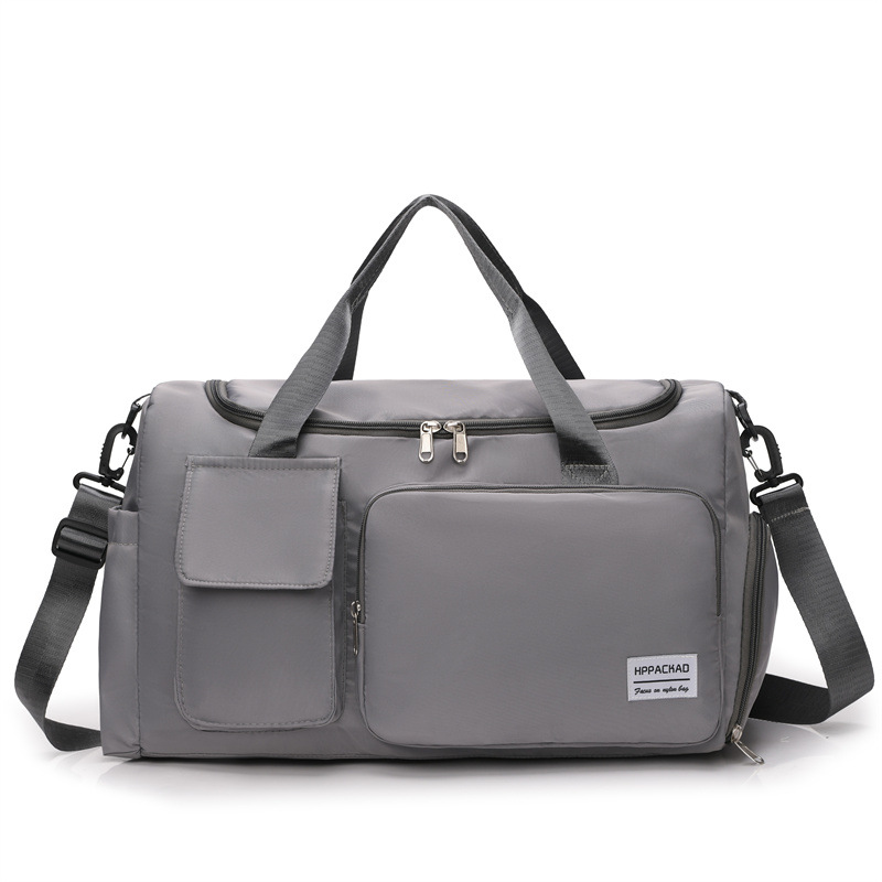 Bolsa de fitness de las mujeres al por mayor nueva gran capacidad crossbody bolsa de deportes de los hombres moda simple impermeable bolsa casual bolsa de viaje