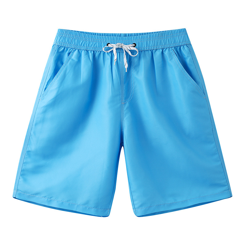 Nuevos pantalones de playa de verano, nuevos pantalones cortos de color sólido deportivos casuales sueltos, pantalones secos de cinco minutos para hombres, pantalones de surf.
