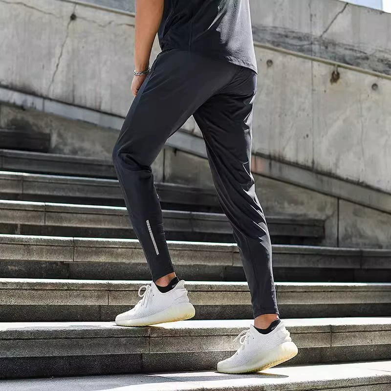 Тонкие спортивные брюки из ледяного шелка мужские свободные штаны быстрорежитая эластичная молния для тренировок повседневные фитнес-брюки прилив