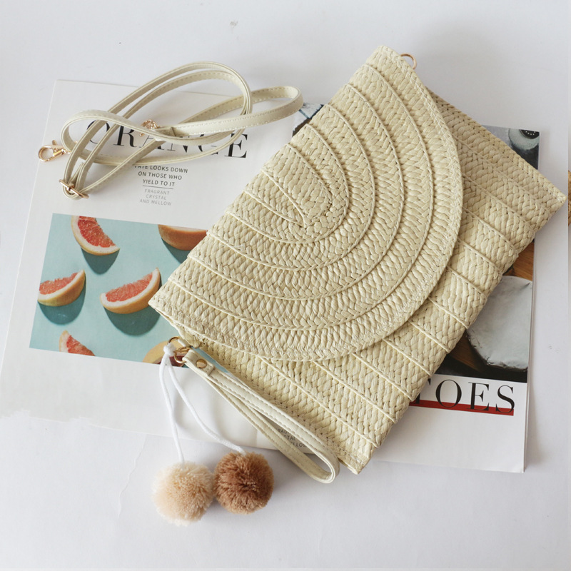 Spot new pillow type hand straw bag hand bag beach bag woven women's portable small square bag