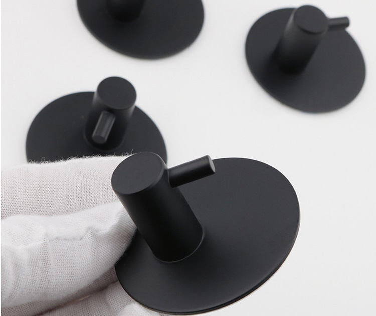 Transfronterizo 304 sostenedor de tejido de acero inoxidable traje de baño libre de perforación de hardware colgante toalla rack traje negro sola varilla