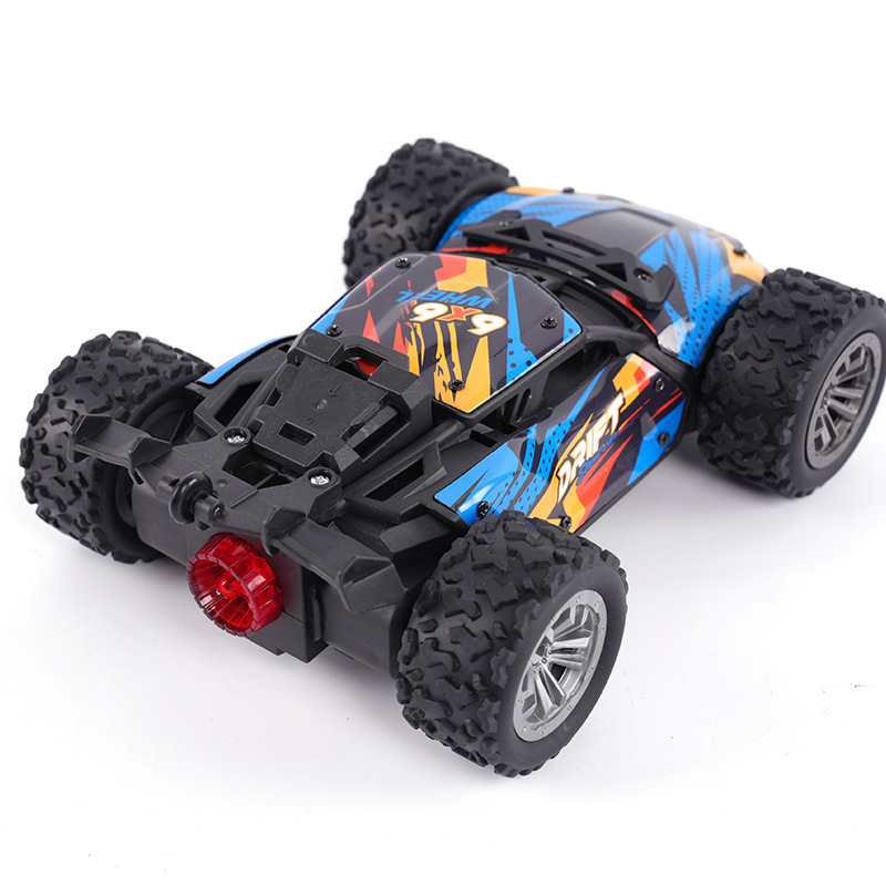 Ventas transfronterizas calientes RC aleación de alta velocidad control remoto coche de carreras spray 4WD coche de juguete giratorio drift coche de acrobacias
