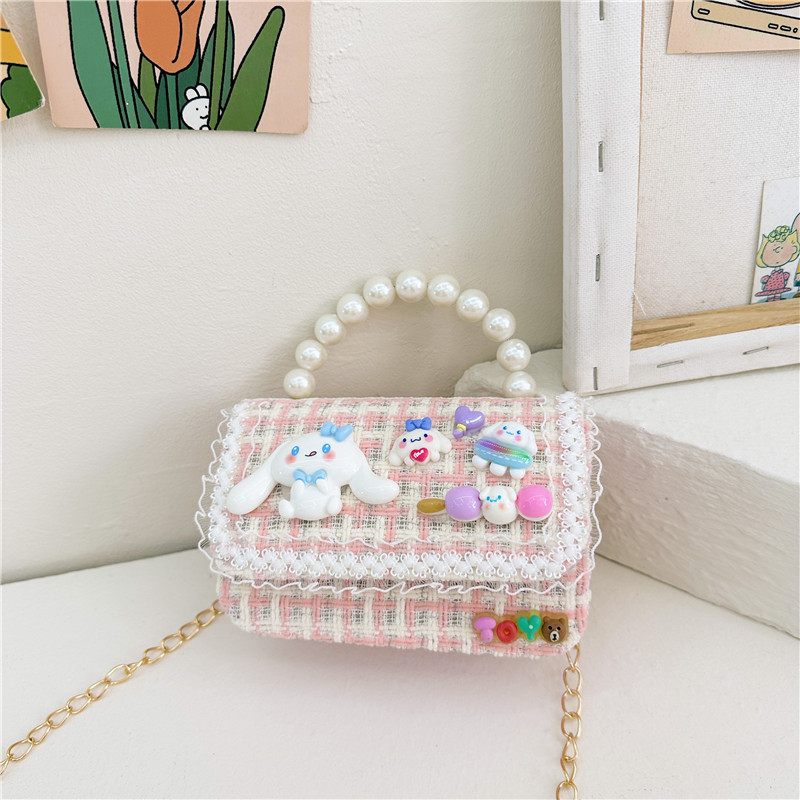 Otoño e Invierno nueva niña monedero dibujos animados lindo accesorios perla bolso versátil estilo occidental bebé bolsa de hombro