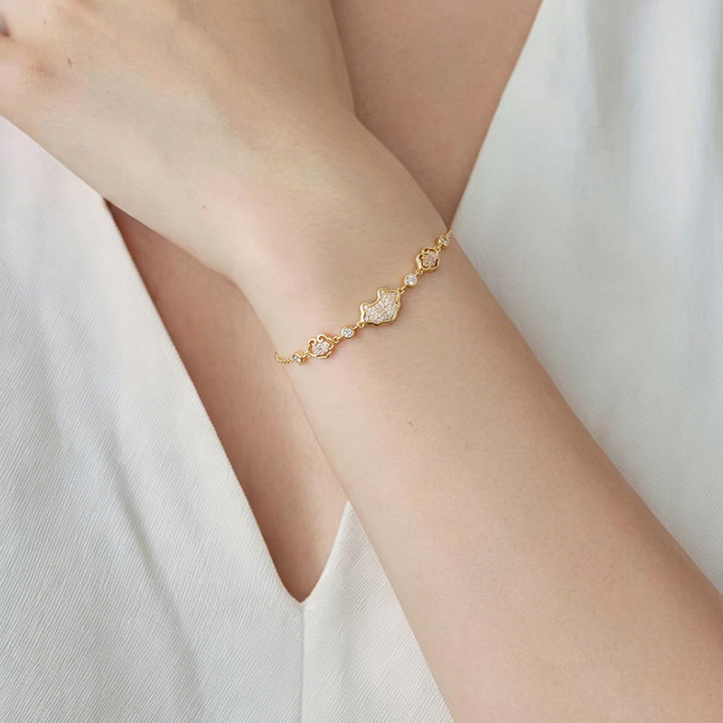 Lắc tay nữ bạc S925 mạ vàng họa tiết như ý phong cách tân cổ điển — Bạc