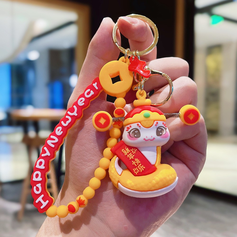 Muñeca de dibujos animados goteo llavero bolsas escolares exquisitas para hombres y mujeres colgantes para agarrar muñecas colgantes para el mercado nocturno regalos al por mayor