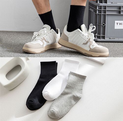 Cotton men's sports mid-calf socks ins solid color black and white gray high quality socks wholesale manufacturer direct sales mall
