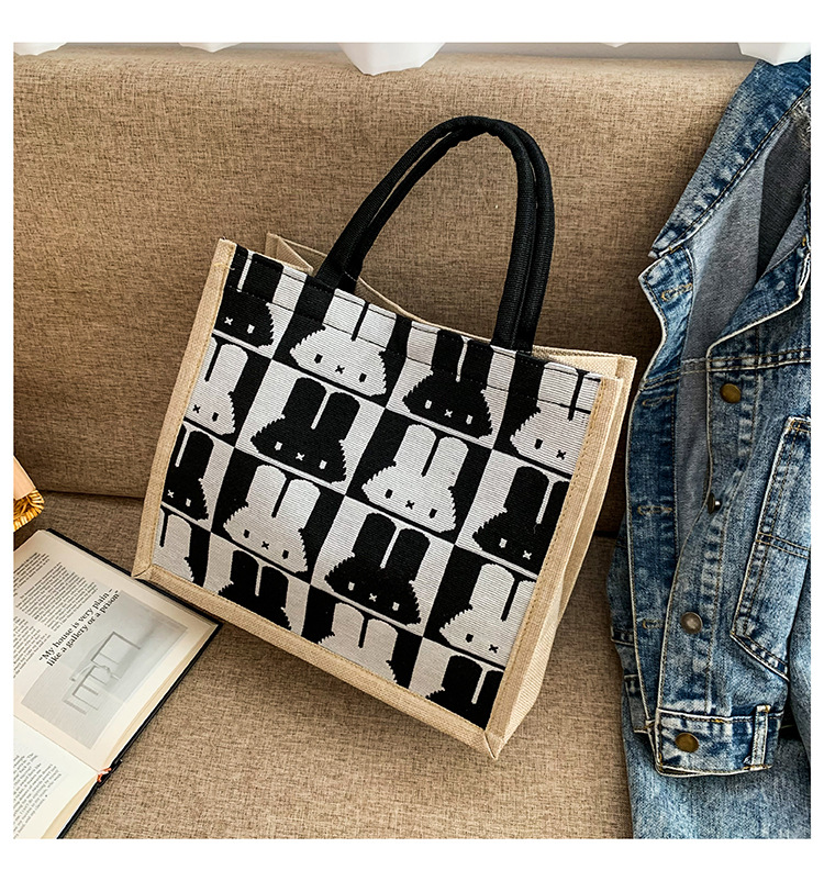 High-end mid-capacity canvas school commuting handbag 2024 new style fashionable and versatile linen single-shoulder tote bag undefined
