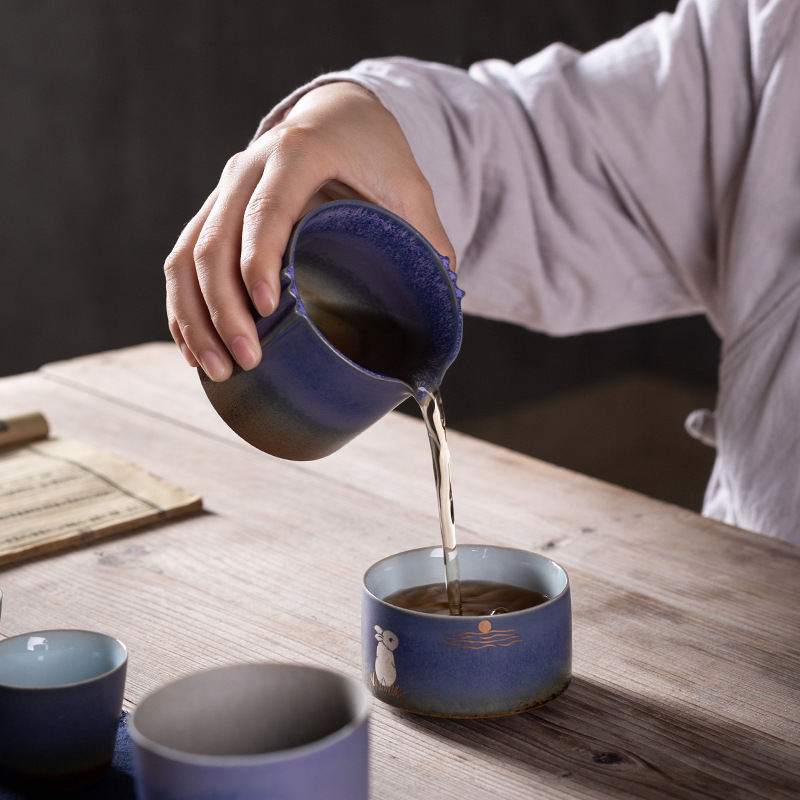 Juego de té viaje traje una olla cuatro tazas portátil Kung Fu taza al aire libre simple estilo japonés tetera retro casa