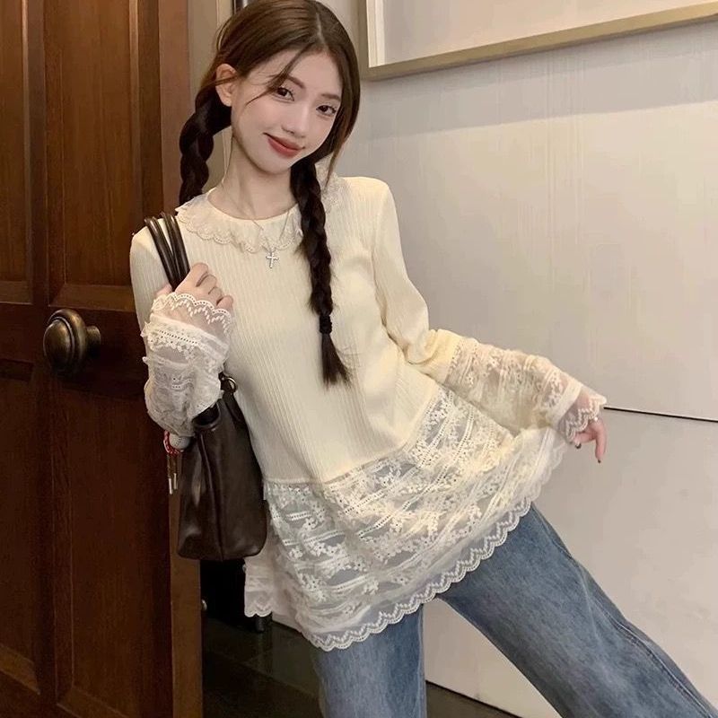 コートの女性は春と秋の短いタイプで腰を収めます。|undefined