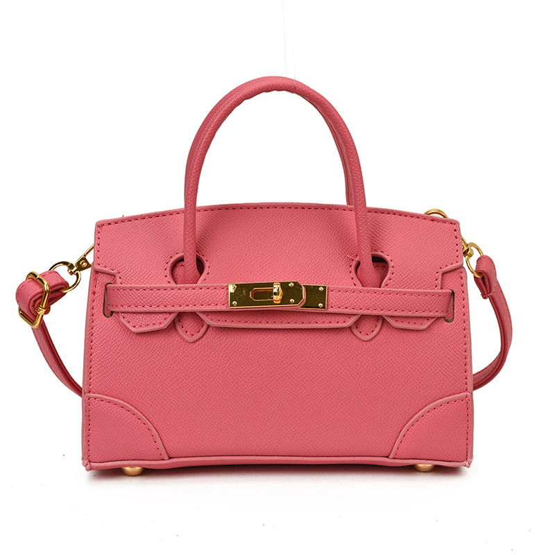 Coreano simple color sólido bolso de hombro para niños y niñas pequeño mini bolso de mano bebé nuevo bolso de comercio exterior transfronterizo para niños