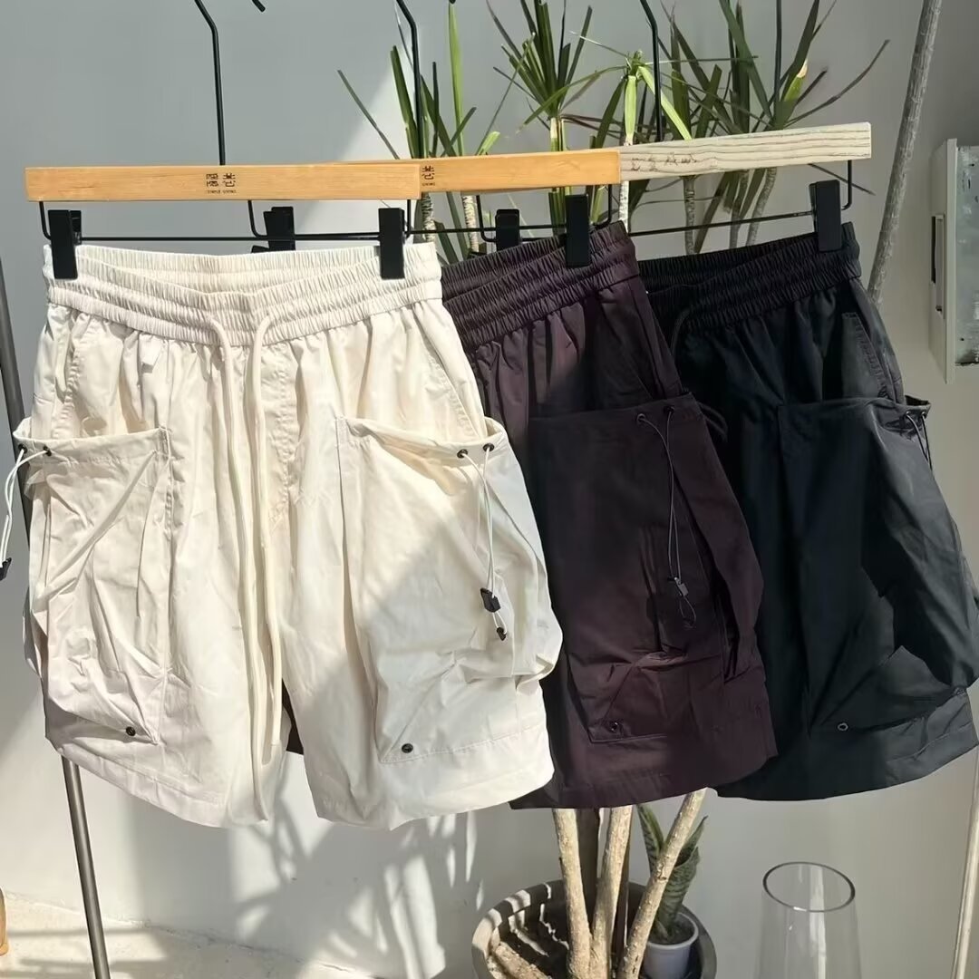 Función de viento de bolsillo de trabajo pantalones cortos para hombres verano forrado de malla brillante sensación fría y rápida secado piernas anchas al aire libre pantalones de cinco puntos para hombres