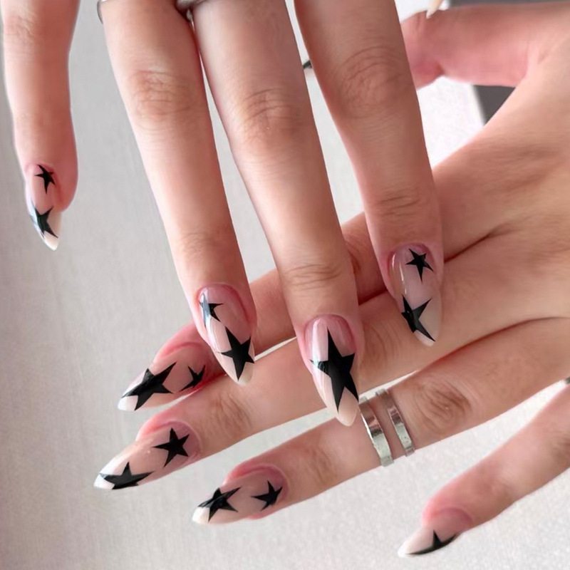 Long almond-shaped Y2K black star press-on nails with a sheer base, sweet and cool style, detachable fake nail patches, wholesale