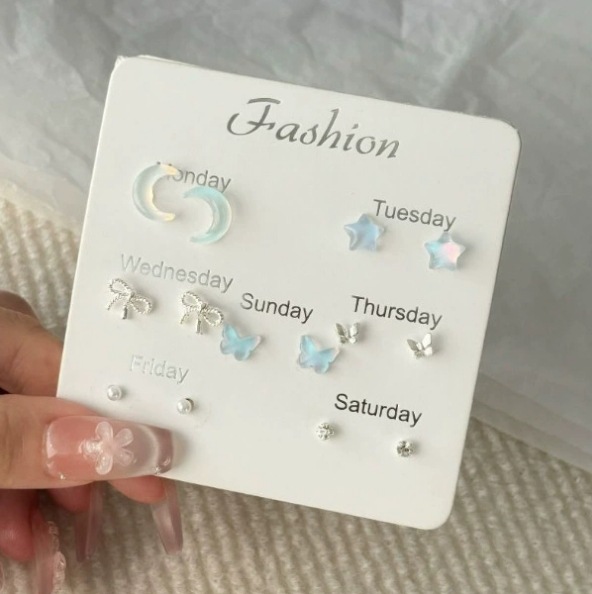 Pendientes de semana de estudiante de plata 925 Pendientes de alta gama de diseño simple de nicho femenino 2024 nuevas orejas de viento de moda ins