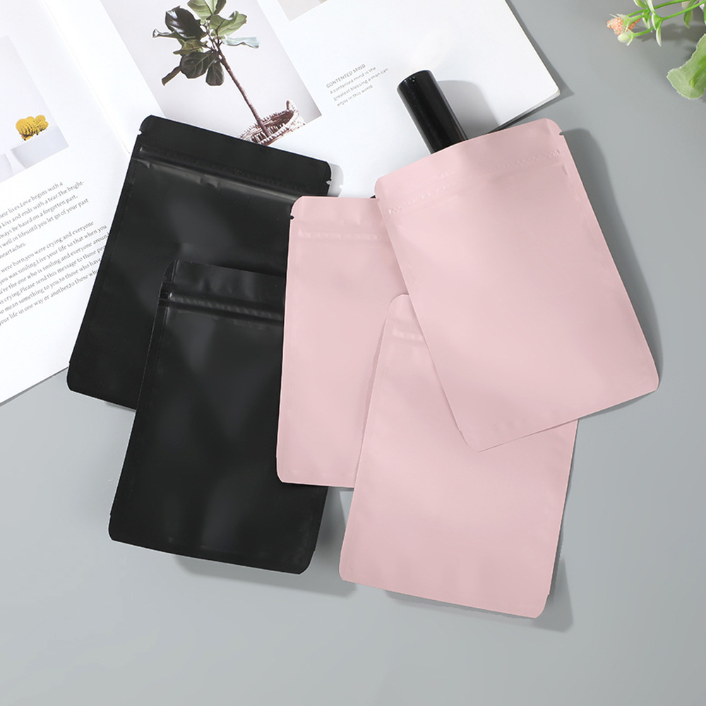 Bolsa con cremallera de ropa Bolsa con cremallera de crisantemo pequeño Bolsa de embalaje de camiseta Bolsa de ropa interior Bolsa de ropa PE esmerilada pequeña bolsa ziplock