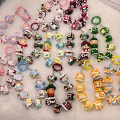 正版の泡のマットの萌粒は手の絵の珠を配合して作った携帯電話のチェーンの数珠を配合します。