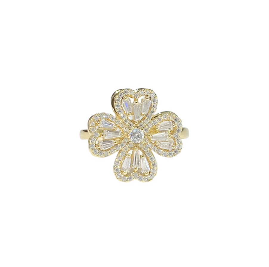 Anillo giratorio de circonita microincrustada con diseño de flor de cuatro hojas, anillo ajustable, flor giratoria tipo molino de viento, estilo fresco para mujer, superventas transfronterizo