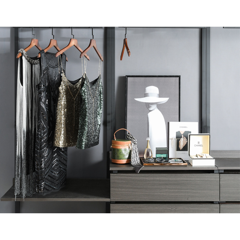 Sala de modelo verde sala de vestuario vestuario moderno simple mesa de maquillaje combinación de decoración caja de almacenamiento de vestido de cena