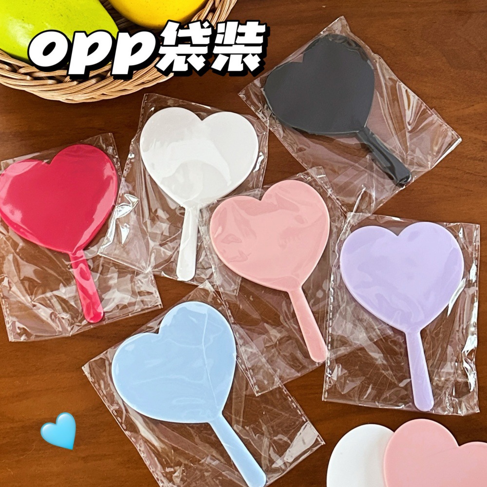 Nuevo estilo pequeño estilo ins, espejo de mano conveniente, corazón de niña, espejo de maquillaje al aire libre, espejo de maquillaje, artículo de moda