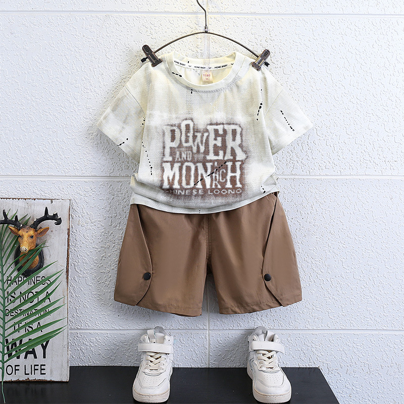 7149 Traje de verano para niños Camiseta de manga corta estampada para niños Estilo de verano para bebés Marca de moda Traje de dos piezas 2025 Nueva tendencia