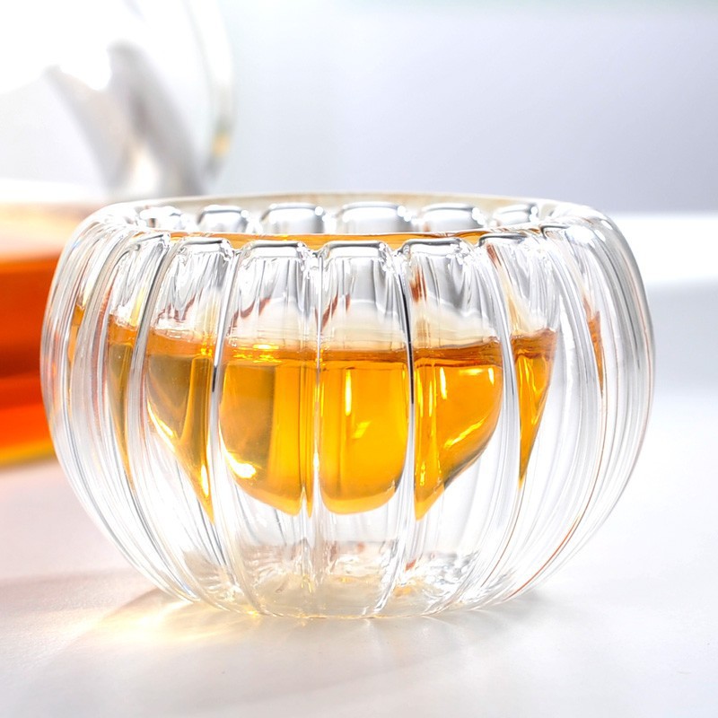 Venta al por mayor de vidrio borosilicato calabaza a rayas taza de té hogar Kung Fu juego de té de vidrio doble taza de té pequeña