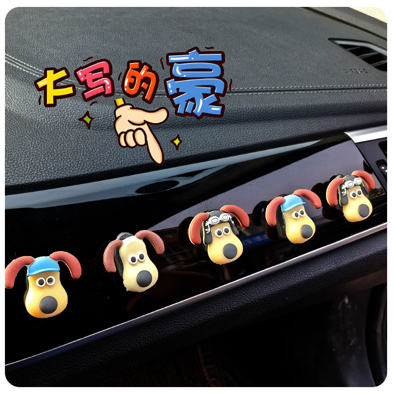 La cabeza de la celebridad de Internet, la batería del coche, el gancho del coche, el gancho pequeño del coche del copiloto delantero, los accesorios del coche