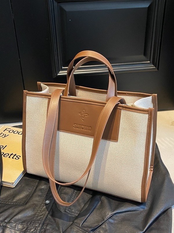 Bolsa de mano de lona de gran capacidad para mujeres caliente nueva moda simple alta textura mochila de viaje