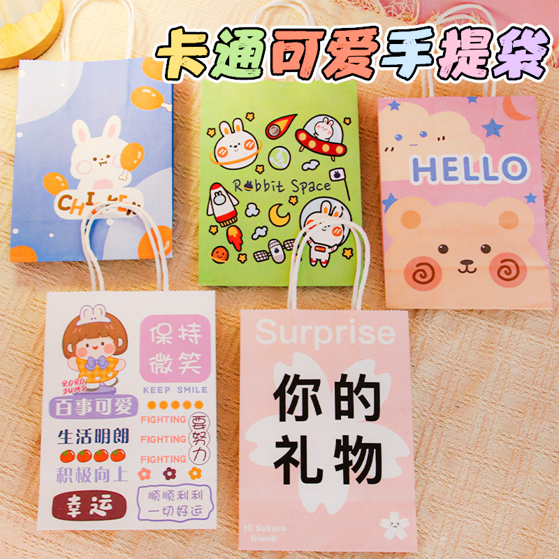 Bolsa de regalo linda de dibujos animados ins bolsa de regalo portátil bolsa de regalo de cumpleaños de papel bolso de tamaño pequeño de tamaño grande y mediano