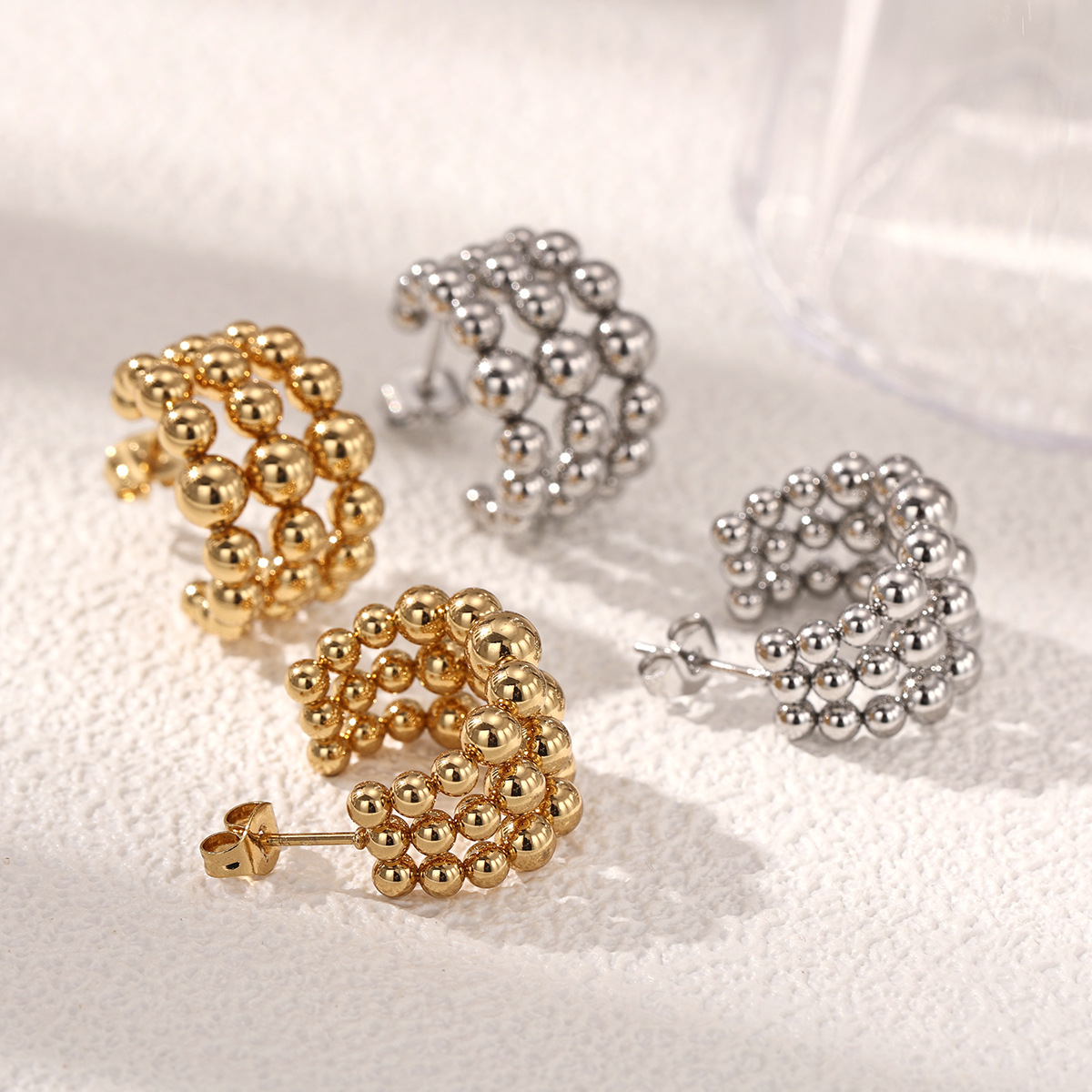 TENA Europa y América de acero inoxidable pendientes de mujer lujo ligero de alta calidad tapones de acero dorado venta caliente joyería de acero de titanio transfronteriza