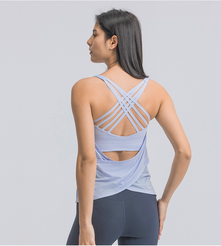 conjunto de yoga de dos piezas con blusa y sujetador de yoga con tirantes cruzados elásticos de color sólido NSDQF127370