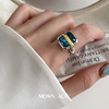 Retro fashionable ring, silver 925 sample, on index finger