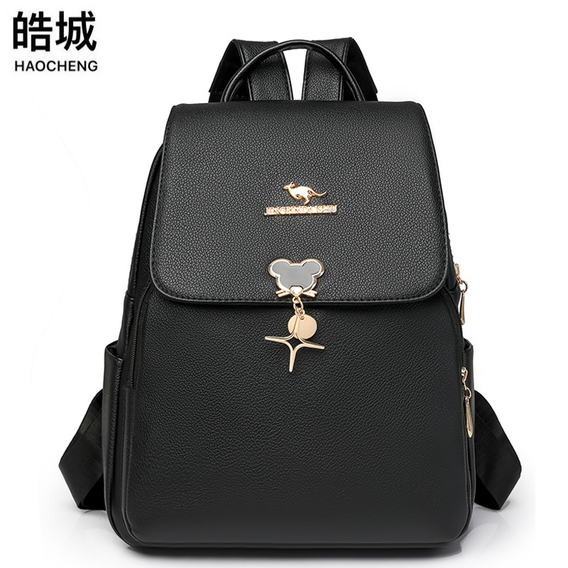 Mochila femenina 2025 primavera nueva moda todo-fósforo bolso femenino de gran capacidad madre de mediana edad mochila de viaje de ocio marea