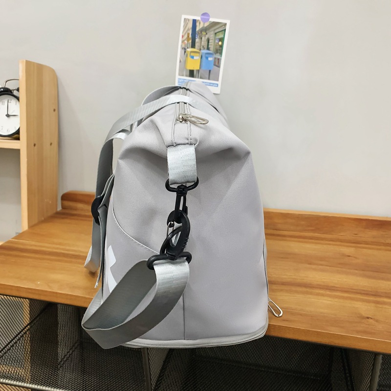 Comercio exterior al por mayor nueva bolsa de viaje de gran capacidad de separación seca y húmeda moda femenina color contraste viaje al aire libre almacenamiento bolsa de equipaje