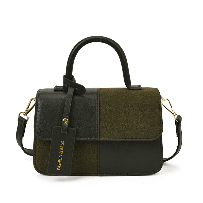 Bolsos de mano de textura alta para mujeres 2025 nueva tendencia europea y americana cruzada retro empalme versátil mochila