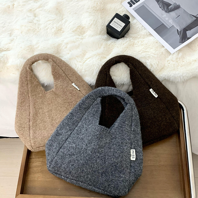 Bolso de hombro 2025 nuevo otoño e invierno nuevo estilo coreano simple y versátil bolso de muñeca de punto de gran capacidad bolso